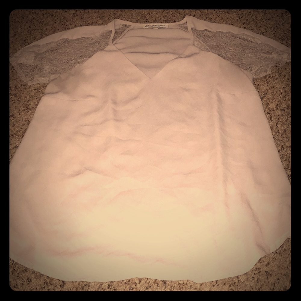 Cream colored Daniel Rainn short sleeve shirt